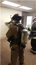 Two Firefighters Listening to the Instructor