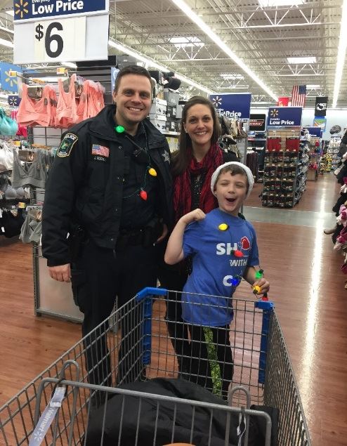 Office with a Woman and Small Child at the Store